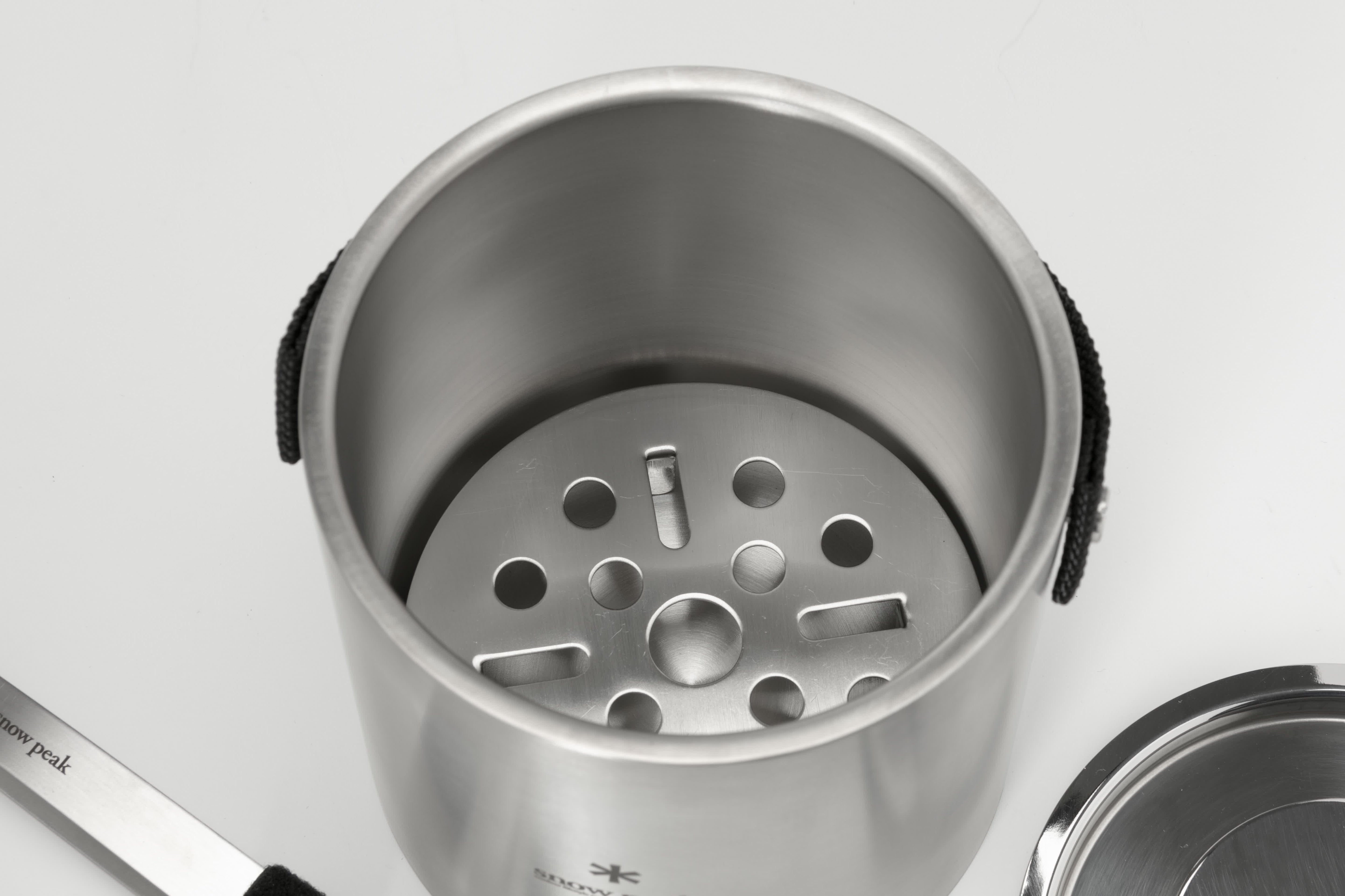 This is a double-layered ice bucket with lid opened.