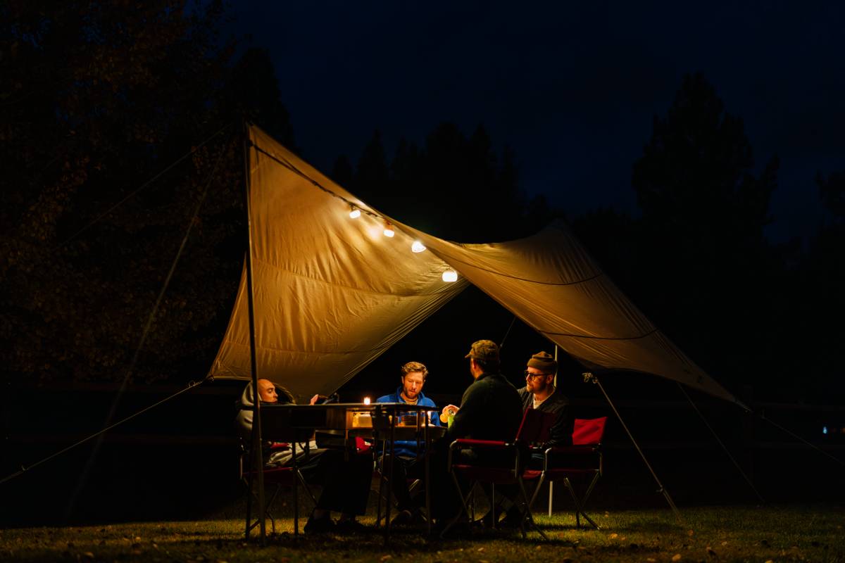 friends enjoying outdoor camping